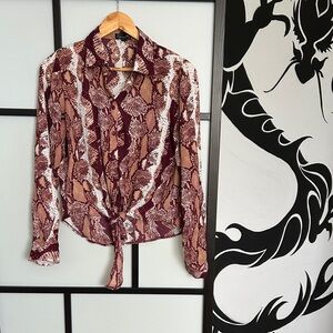 Red see through top asymmetrical ties in front